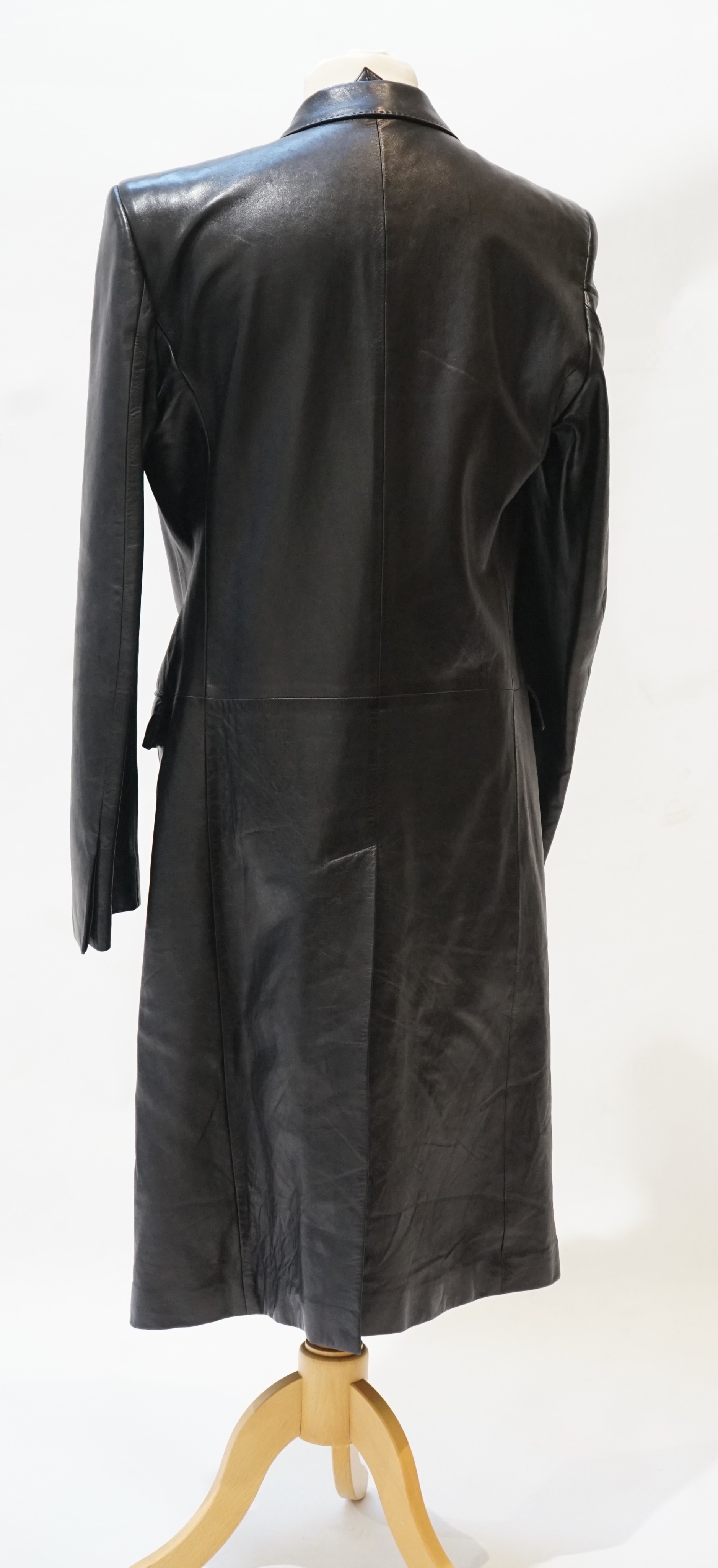 A gentleman's Yves Saint Laurent black leather trenchcoat, size IT 52 (UK 42)